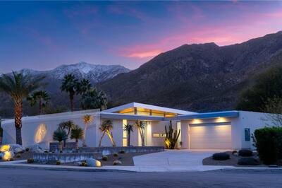Photo 9: street facade at dusk with mountains